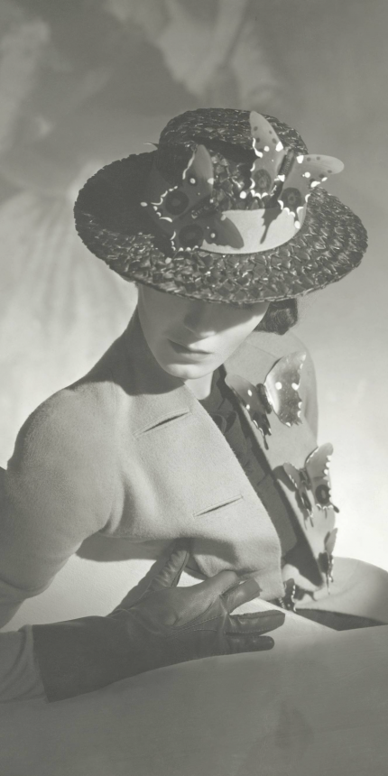 Collarless jacket and hat with butterfly trimmings, British Vogue, 15 march 1937. Photograph by P. Horst Conde Nast via Getty Images.